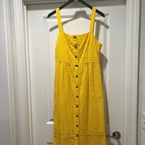 Yellow Buttoned Down Sundress with thick scraps and open square design.